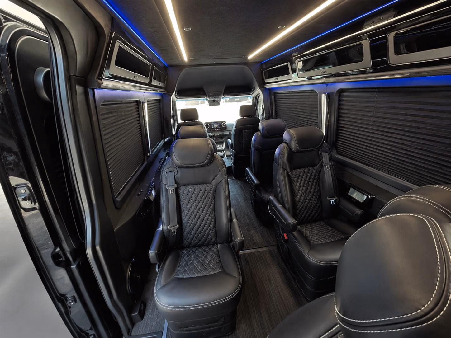 newport beach sprinter van with driver interior